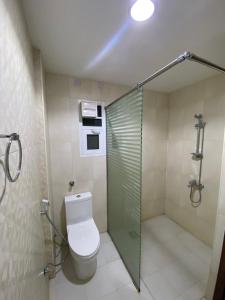 Vannituba majutusasutuses ALJAWHARA INN HOTEL