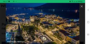 an image of a city at night with lights at Apartmani Gaga in Đenovići