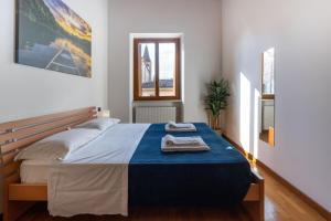 Posteľ alebo postele v izbe v ubytovaní Residenza al Corso