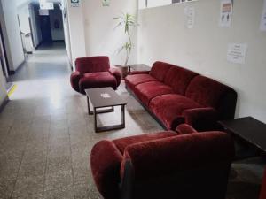 Χώρος καθιστικού στο Hotel Estación Central