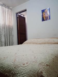 Ένα ή περισσότερα κρεβάτια σε δωμάτιο στο Hotel Estación Central