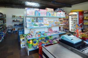 a store filled with lots of toys and other items at Residence Oasis in Alghero
