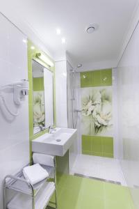 Ванная комната в Hotel Tetřeví Boudy