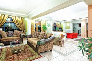 A seating area at Anastassiou Hotel - Bike and motorcycle friendly hotel