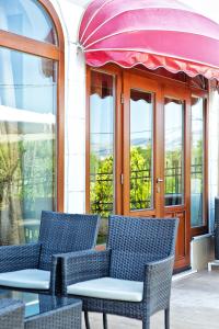 A seating area at Anastassiou Hotel - Bike and motorcycle friendly hotel
