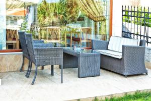 A seating area at Anastassiou Hotel - Bike and motorcycle friendly hotel