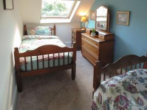 מיטה או מיטות בחדר ב-Newburgh C Listed Townhouse