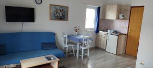 Kuchyň nebo kuchyňský kout v ubytování Apartments Barcarola