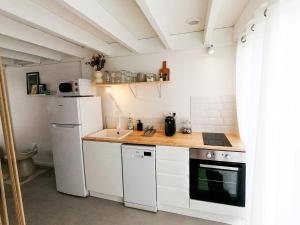 Kuchyňa alebo kuchynka v ubytovaní Little Casa Royan