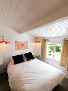 Posteľ alebo postele v izbe v ubytovaní Little Casa Royan