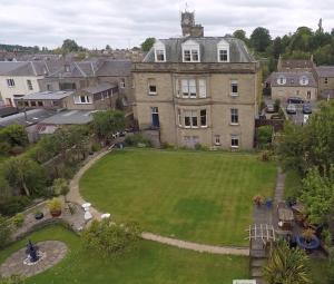 an aerial view of a large house with a yard at Bank Guest House in Coldstream