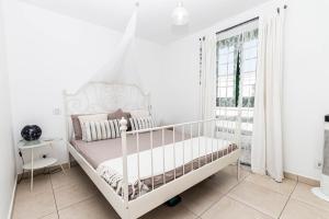 Katil atau katil-katil dalam bilik di Apartamento Gemini Maspalomas