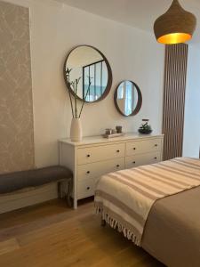 Łóżko lub łóżka w pokoju w obiekcie Appartement moderne en plein centre D'Epernay