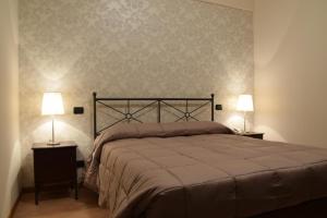 Una cama o camas en una habitación de Hotel Il boschetto