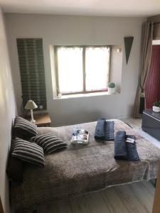 Postel nebo postele na pokoji v ubytování Gîte entièrement rénové Bord de Sèvre + 18 fotografií