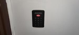 a remote control on the door of a room at Şirinevler 304 in Istanbul