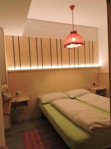 Posteľ alebo postele v izbe v ubytovaní De Prealon Apartment