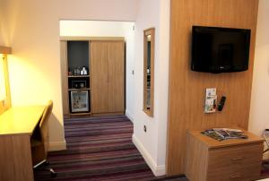 TV a/nebo společenská místnost v ubytování Holiday Inn Darlington-A1 Scotch Corner by IHG