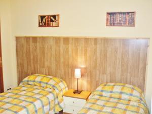 Posteľ alebo postele v izbe v ubytovaní Al verde limone