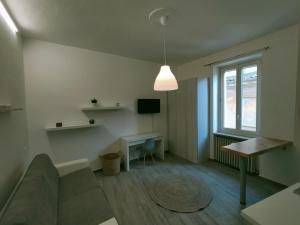 TV a/nebo společenská místnost v ubytování Palazzo Cavour