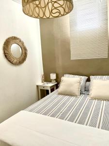 Posteľ alebo postele v izbe v ubytovaní Magnifique appartement au cœur du centre ville
