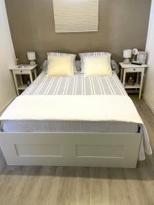 Posteľ alebo postele v izbe v ubytovaní Magnifique appartement au cœur du centre ville