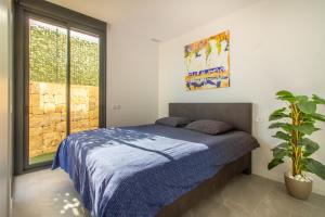 Ένα ή περισσότερα κρεβάτια σε δωμάτιο στο Villa Esmeralda 20 by BookaParadise +6 φωτογραφίες