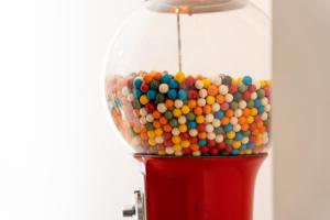 a lamp with a bunch of colorful balls in it at The Chocolate Suites in Bruges