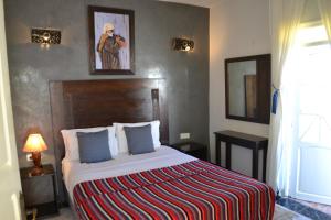 Voodi või voodid majutusasutuse Hotel Cap Sim toas