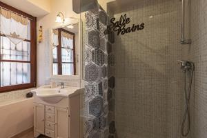 a bathroom with a sink and a shower at Casa al Lago di Como in Riva Cernobbio in Cernobbio