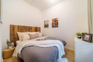 Postel nebo postele na pokoji v ubytování Rákosárna Suites & Apartments