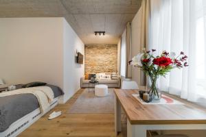 Postel nebo postele na pokoji v ubytování Rákosárna Suites & Apartments