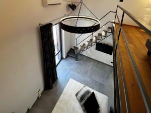 A bed or beds in a room at Sant'Andrea - Luxury Rooms in Vucciria