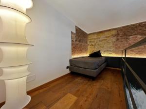 A seating area at Sant'Andrea - Luxury Rooms in Vucciria