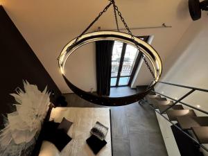 A bed or beds in a room at Sant'Andrea - Luxury Rooms in Vucciria