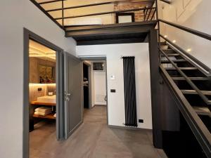 A bed or beds in a room at Sant'Andrea - Luxury Rooms in Vucciria