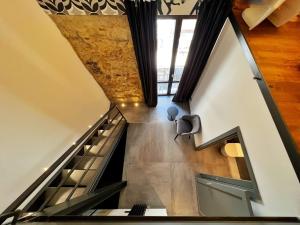 A seating area at Sant'Andrea - Luxury Rooms in Vucciria