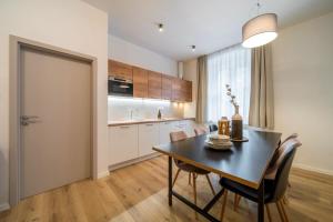 Kuchyň nebo kuchyňský kout v ubytování Rákosárna Suites & Apartments