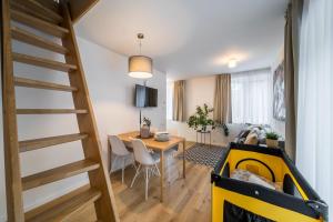 TV a/nebo společenská místnost v ubytování Rákosárna Suites & Apartments