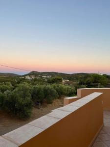 a view of the sunset from the balcony of a house at Emmanouil in Kythira