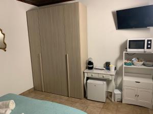 A kitchen or kitchenette at Camera graziosa