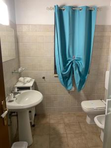 A bathroom at Camera graziosa