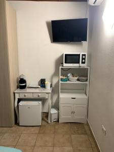 A kitchen or kitchenette at Camera graziosa