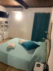 A bed or beds in a room at Camera graziosa