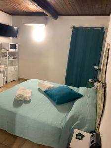A bed or beds in a room at Camera graziosa