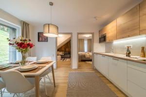 Kuchyň nebo kuchyňský kout v ubytování Rákosárna Suites & Apartments