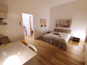 Posteľ alebo postele v izbe v ubytovaní Alcamo Rooms con garage privato