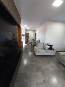Posezení v ubytování apt 201 novo completo no centro da cidade