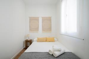 Postel nebo postele na pokoji v ubytování Quiet and cosy flat in N. Salamanca