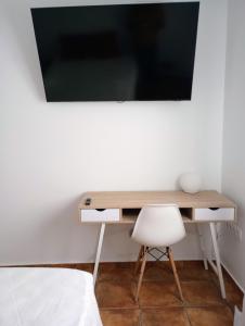 TV a/nebo společenská místnost v ubytování Casa de Campo Los Manueles Ideal Perros Pet Friendly